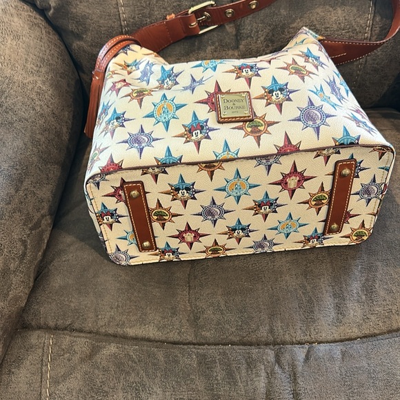 Dooney and Bourke Disney’s passport pattern satchel gently used zipper closure - Picture 7 of 11